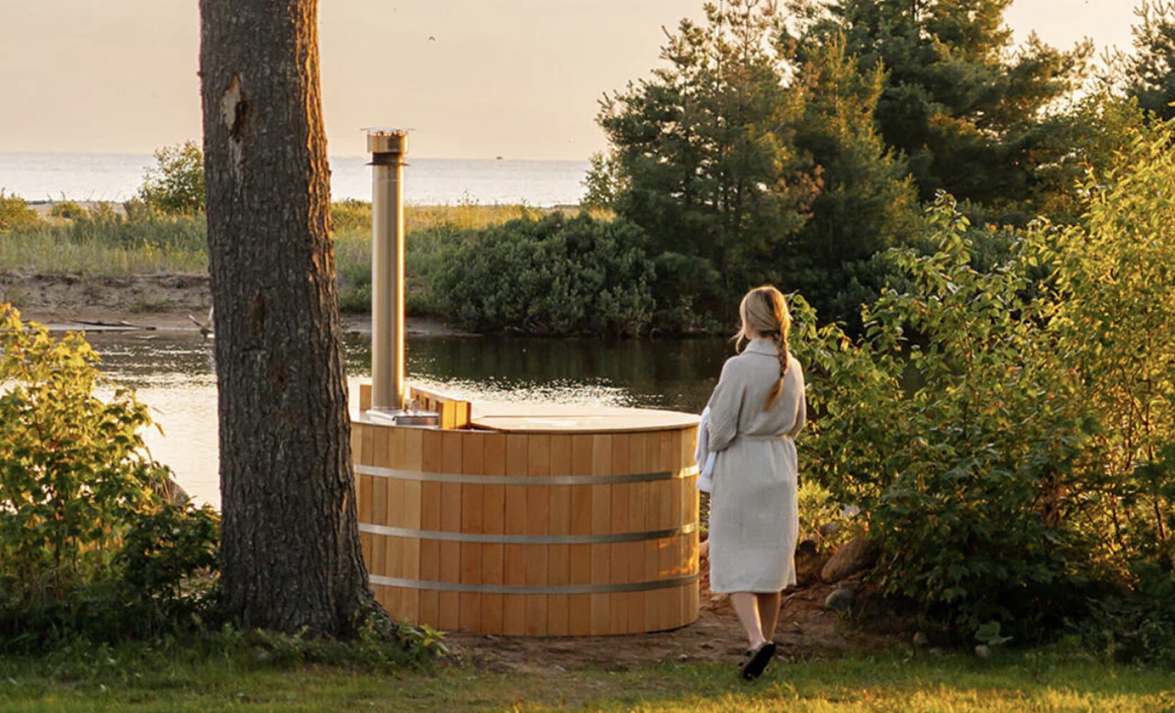 Wood fired hot tub set up for hire in a garden